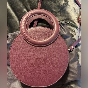 Purple leather purse hand made in Morocco. Has never been used